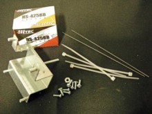 Parts in the Just the Guts Kit:  Servo, Servo / ST-400 mounting bracket, 4 - #4 screws, 4 - #6 screws, 1 - #8 nut, 4 - wire ties, & 2 6" pieces of piano wire.
